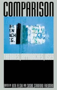 Image of cover of book "Comparison..." with image of a blue and black composite image of paint and text