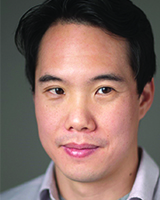 Head shot image of Charles Yu wearing a light purple shirt