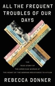 Cover of the book "All the Frequent Troubles of Our Days." On the cover there are scraps of paper and a photograph of Mildred Harnack in the shape of an X.
