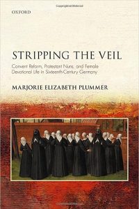 This is a book cover with a picture of a group of nuns dressed in black habits with white veils.