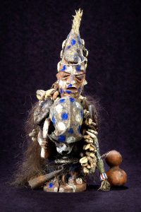 This is a statue of Shapona, the West African God of Smallpox. 