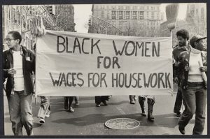 THis is a photograph of black protestors holding a sign that says "Black Women for Wages for Housework"