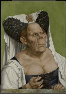 A painted image of an elderly woman with lively eyes set deep in their sockets, a snub nose, wide nostrils, pimply skin, a hairy mole, bulging forehead and a prominent square chin rests one hand on a marble parapet. She is elegantly and aristocratically dressed.