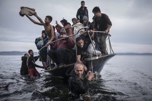 Migrants arrive near Skala, on the Greek island of Lesbos, on November 16, 2015.