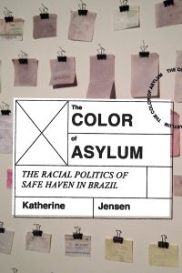The cover image of The Color of Asylum The Racial Politics of Safe Haven in Brazil. There is a photograph of papers clipped to a wall. 