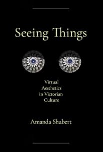 Image of a black book cover with two flower-shaped white eyes on it. 